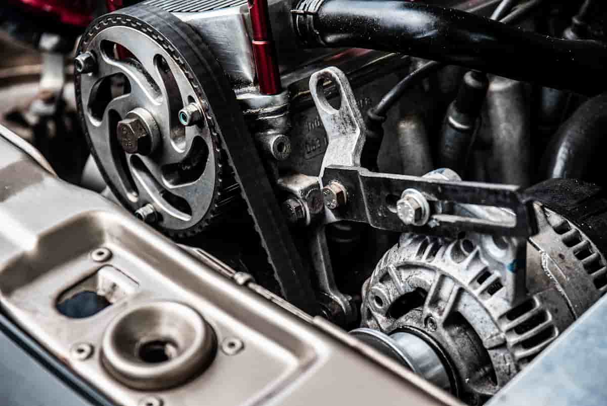 Alternator being replaced in a car engine during an on-site repair in Hopkinsville, KY