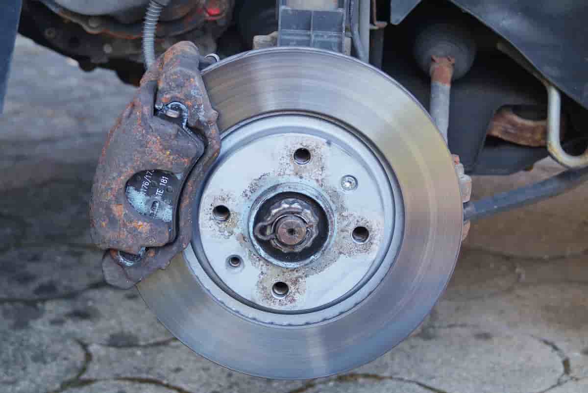 Brake rotor and pads being replaced during a mobile brake repair in Hopkinsville, KY